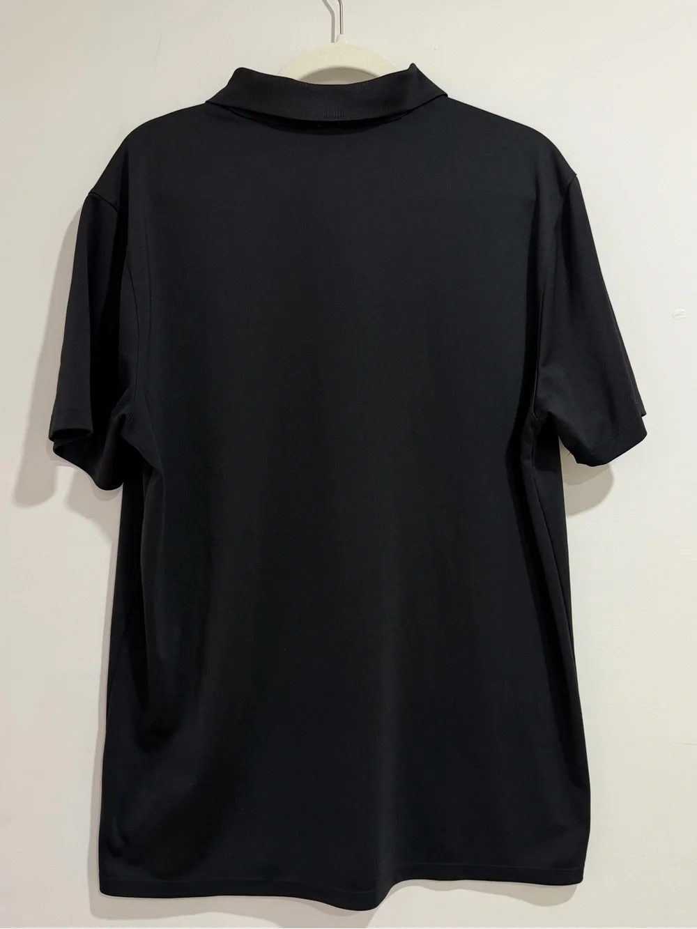 Nike Black Polo Shirt with White Swoosh